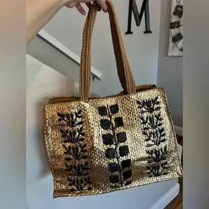 New gold metallic woven straw tote